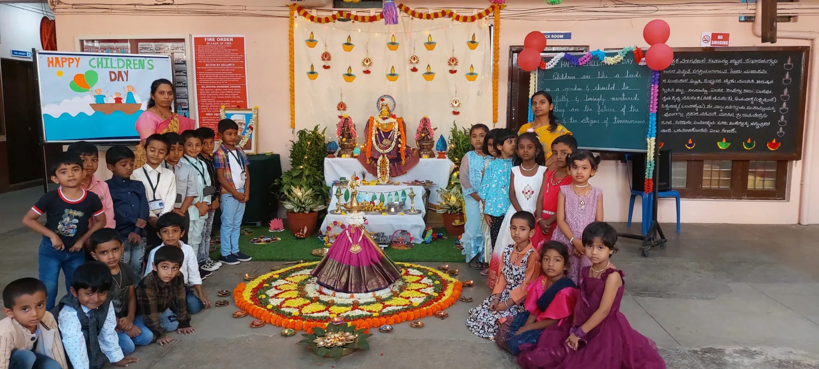 Students in traditional dress gathered on the school ground for a flag hoisting ceremony