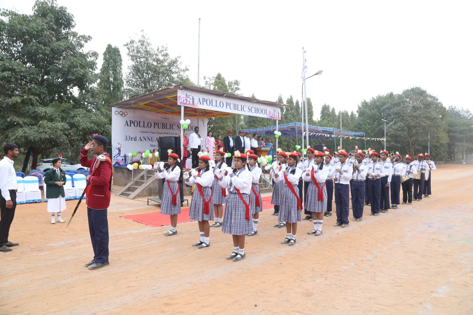 Students and staff lined up for a march-past on the school ground